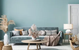 Living room with light blue walls and white trim